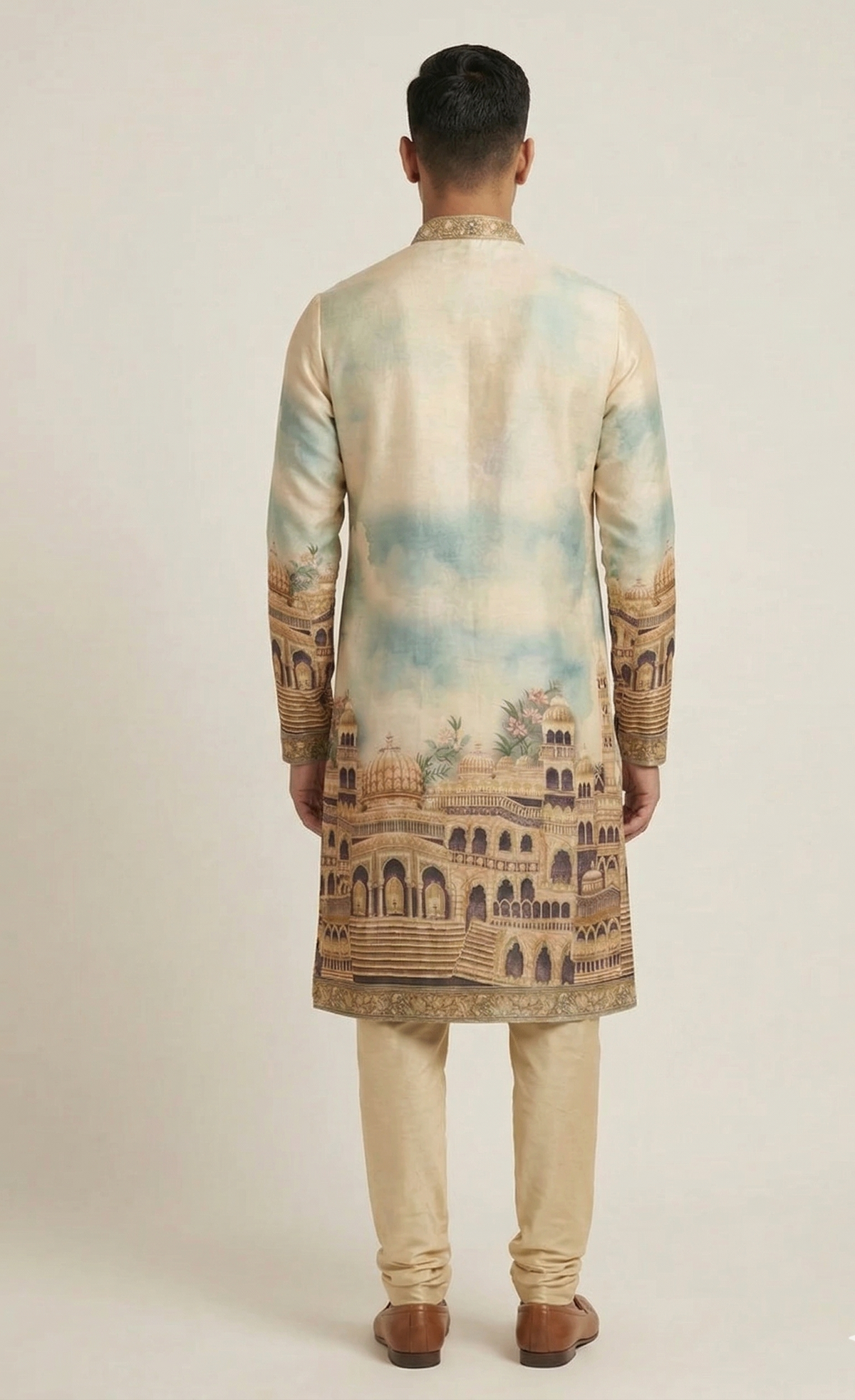Full look: ivory and blue kurta pajama set inspired by the ghats of Varanasi, with a soft sky-inspired print and detailed collar embroidery
