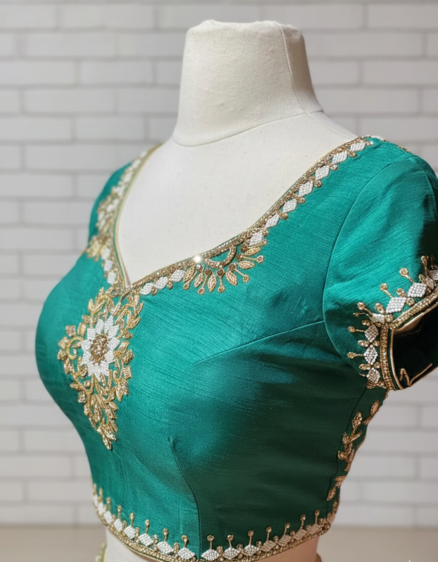 Pearl white skirt with a pine green blouse lehenga with a net dupatta in raw silk, Nazranaa (view 2)