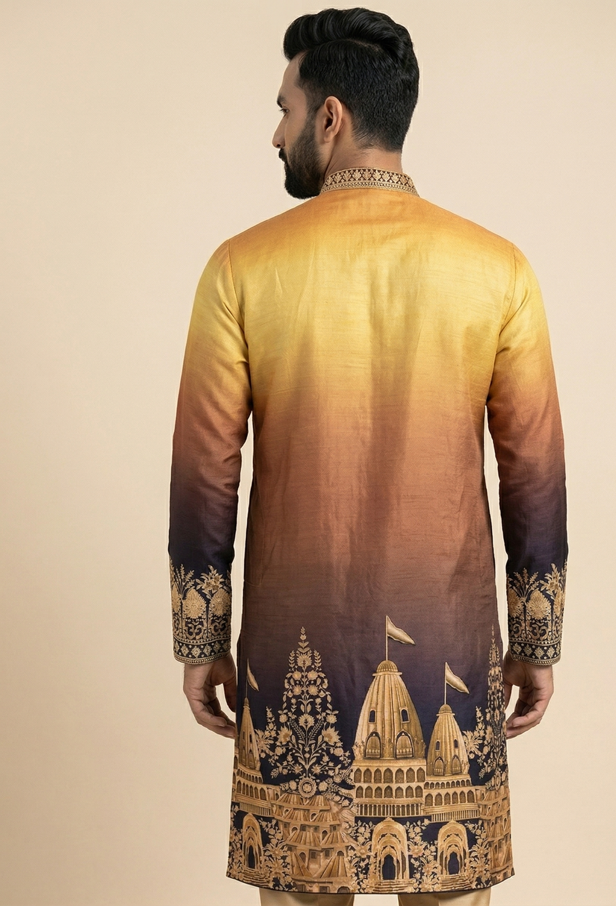 Ombre saffron and gold fading into deep navy kurta pajama set inspired by the Mahakumbh, finished with embroidered cuffs and collar, Nazranaa (view 2)