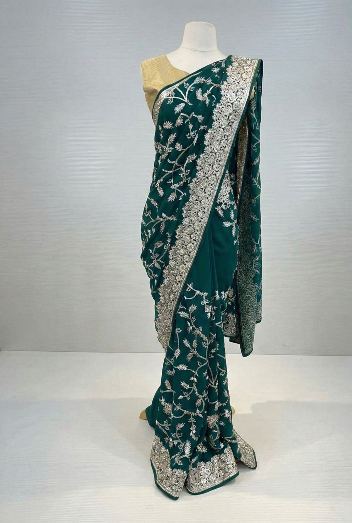 Emerald green saree for weddings, receptions, and festive occasions