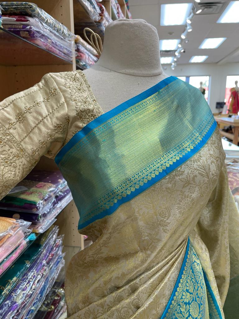 Pistachio Green Kanjeevaram Silk Saree with Teal Zari Border
