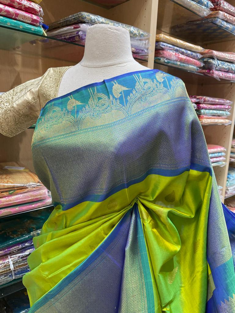 Lime Green Kanjeevaram Silk Saree with Blue Zari Border and Pallu