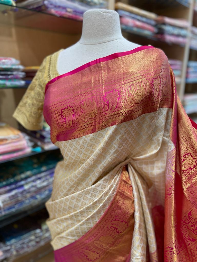 Cream Kanjeevaram Silk Saree with Magenta and Gold Zari Border