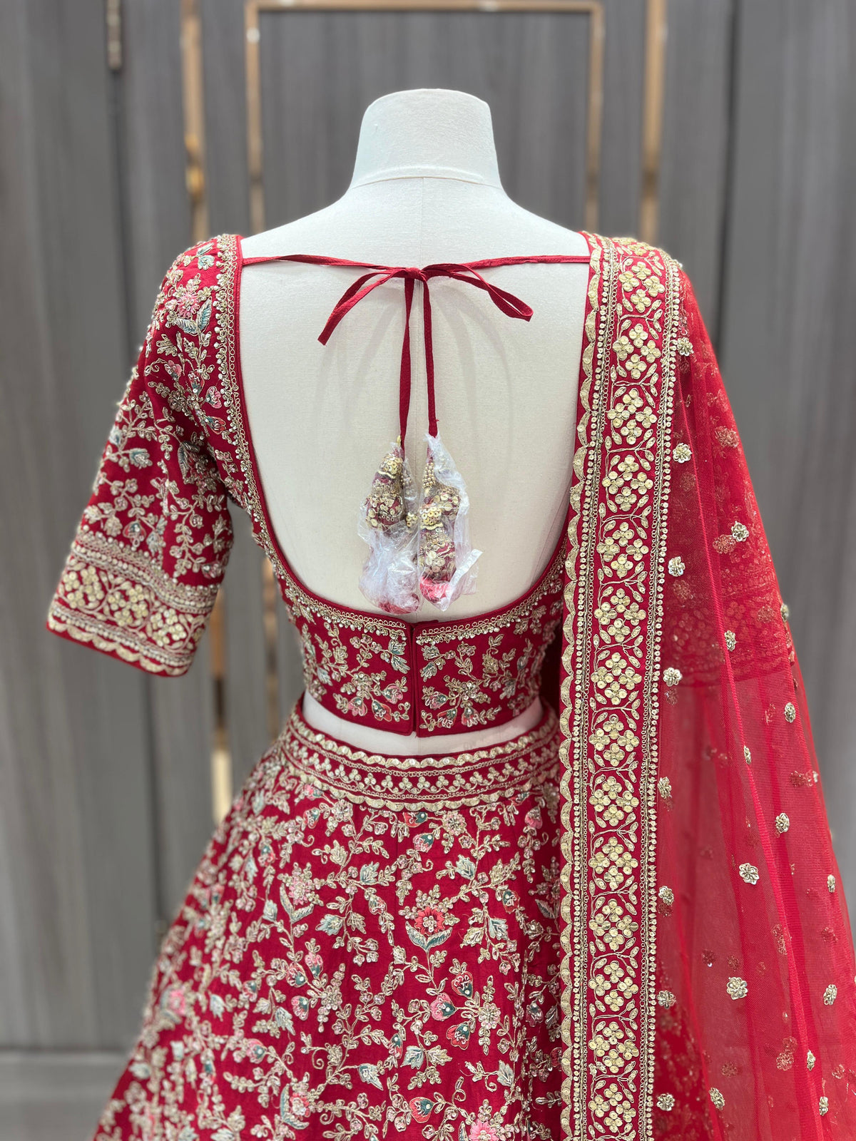 Red Floral Bridal Lehenga with Gold Border and Net Dupatta