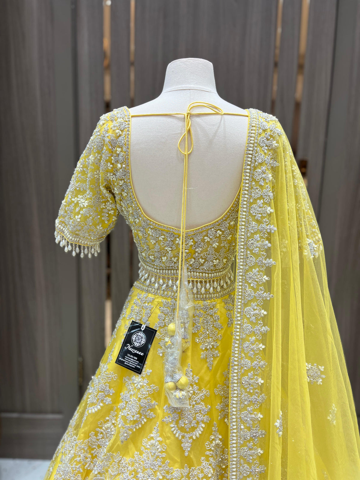Yellow Bridal Lehenga with White Embroidery and Net Dupatta
