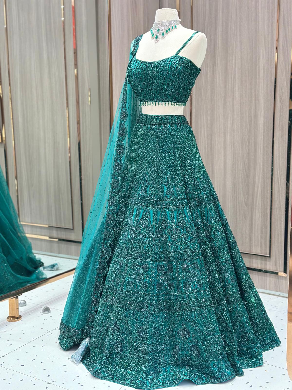Emerald Green Bridal Lehenga with Stone Work Blouse and Net Dupatta