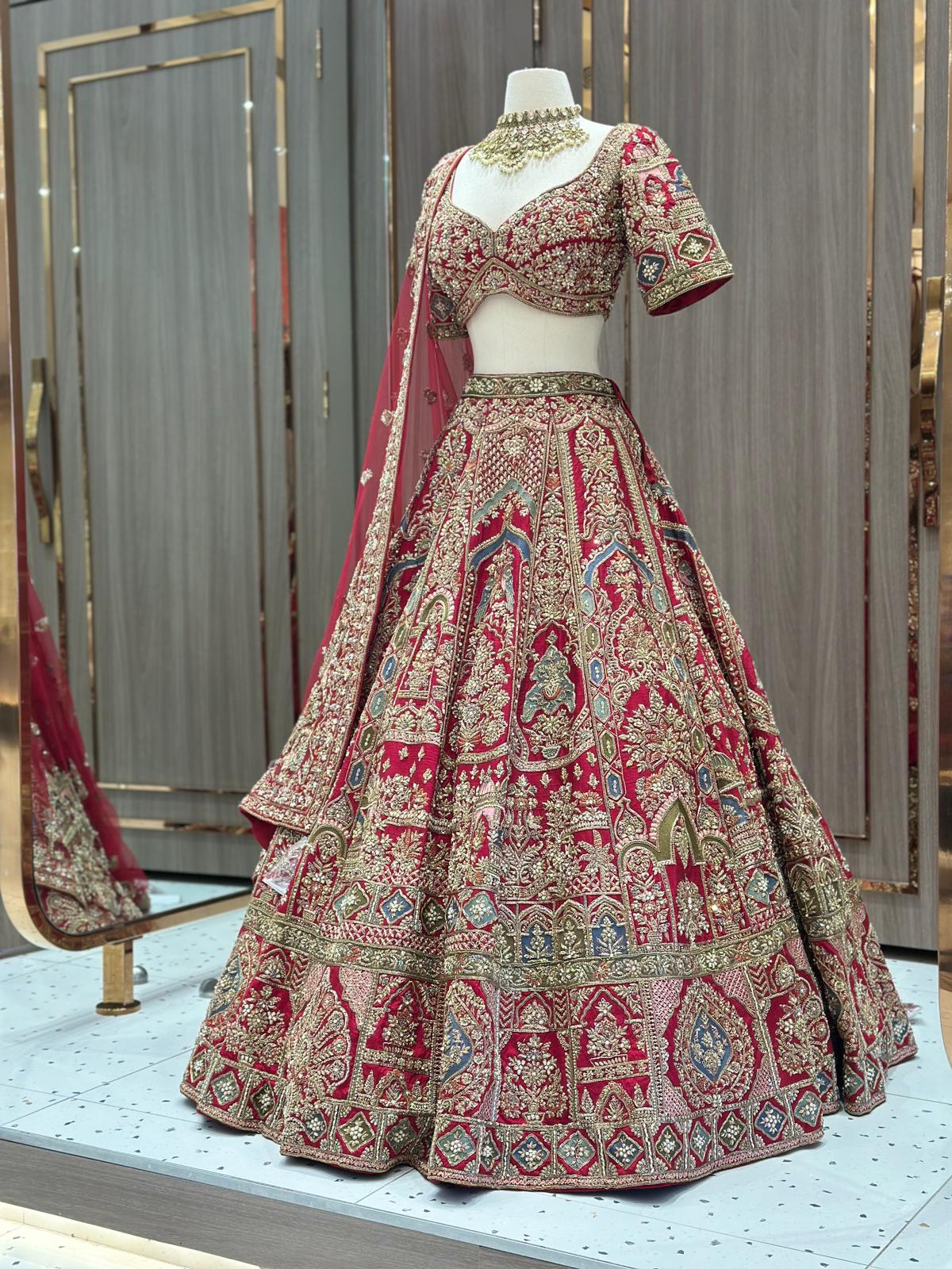 Red Bridal Lehenga with Multicolor Thread Embroidery and Net Dupatta