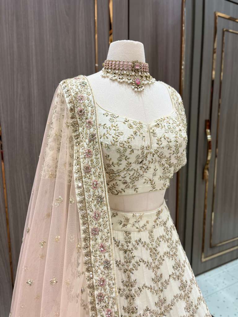 Ivory Bridal Lehenga with Gold and Pastel Embroidery and Net Dupatta