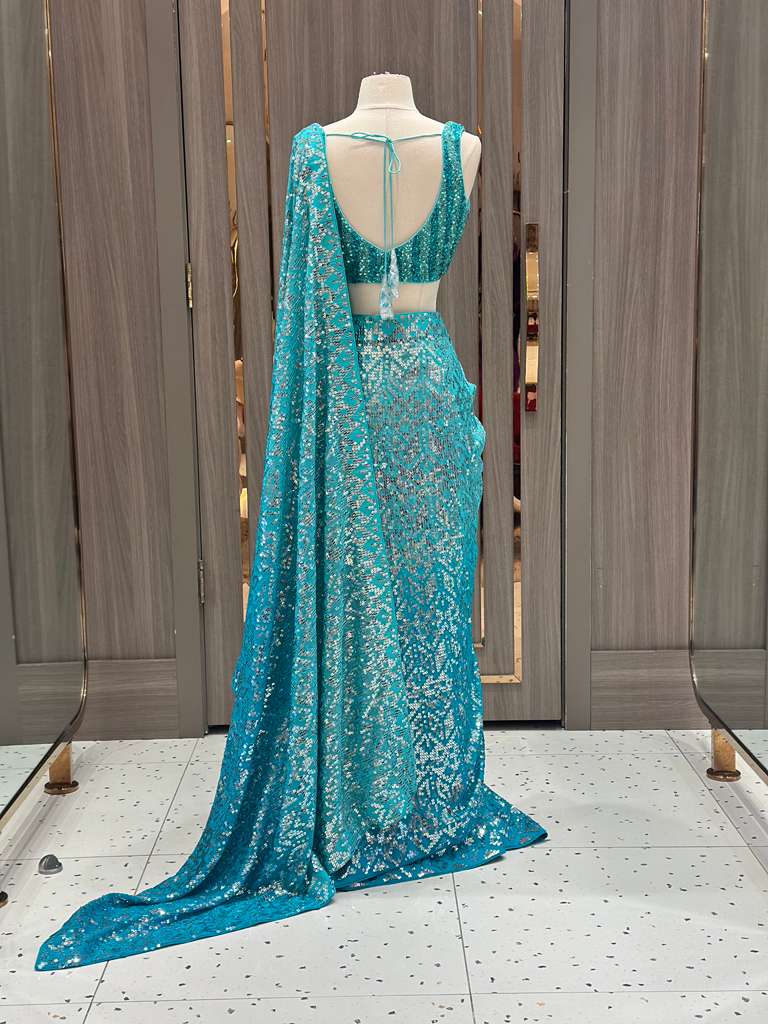 Aqua Blue Sequin Saree with Stripe Work and Sleeveless Blouse