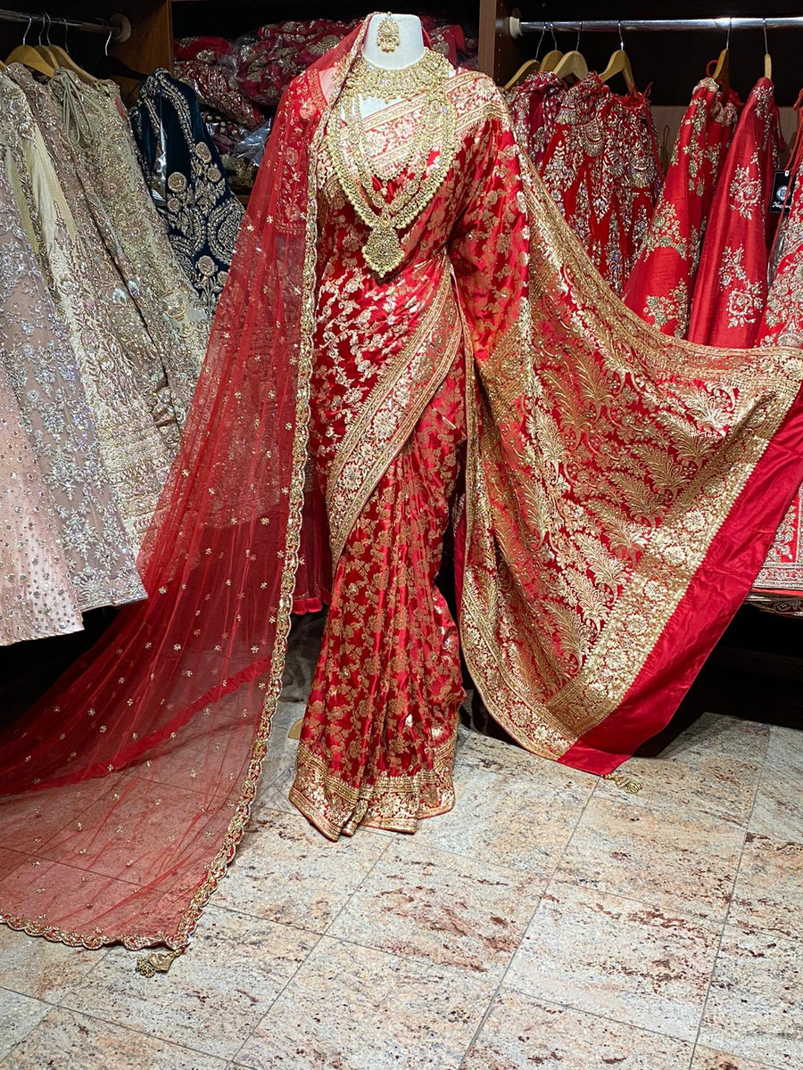 Red Banarasi saree, featured in Nazranaa's guide on choosing Banarasi sarees for your wedding day