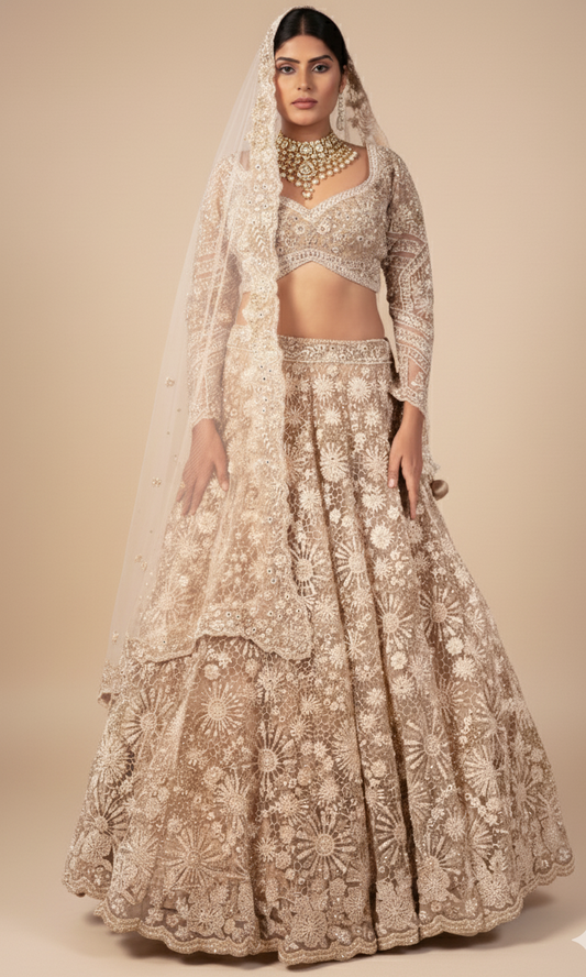 Bisque bridal lehenga in net with satin silk lining, Nazranaa