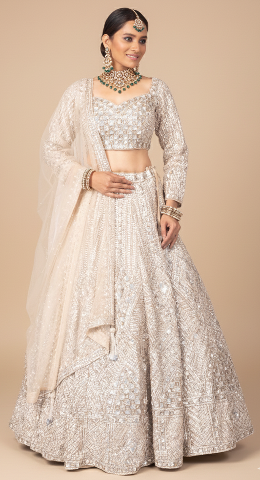 Bisque bridal lehenga with a matching blouse and sheer dupatta, Nazranaa