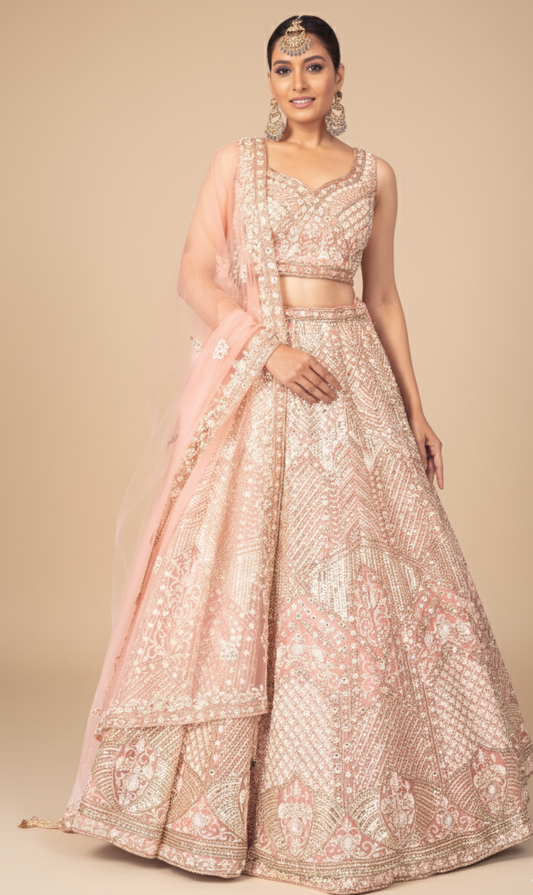 Dark salmon flared bridal lehenga with a coordinating top, Nazranaa