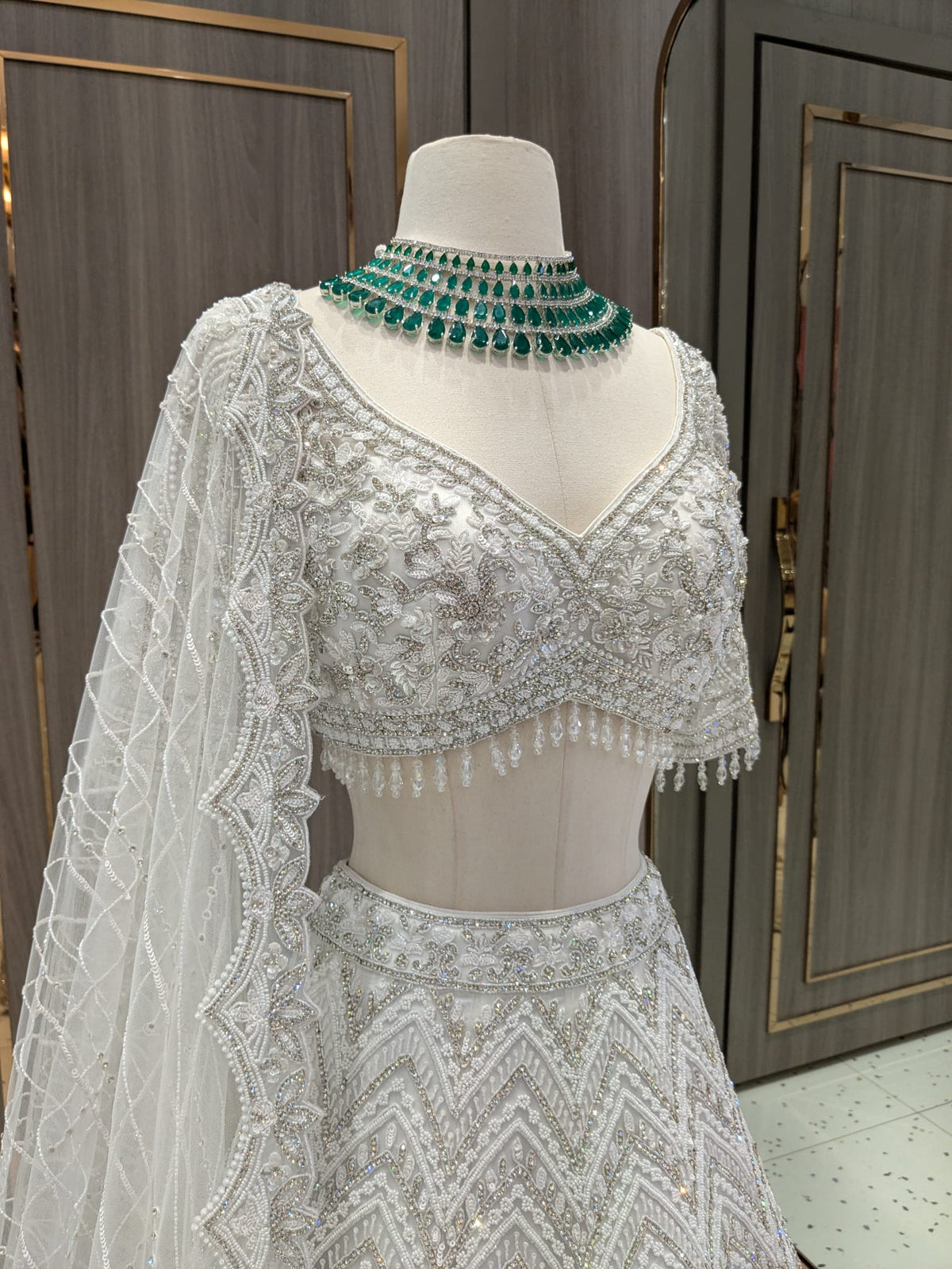 White Tonal Bridal Lehenga with Silver Stones, Pearls and Sequin Work