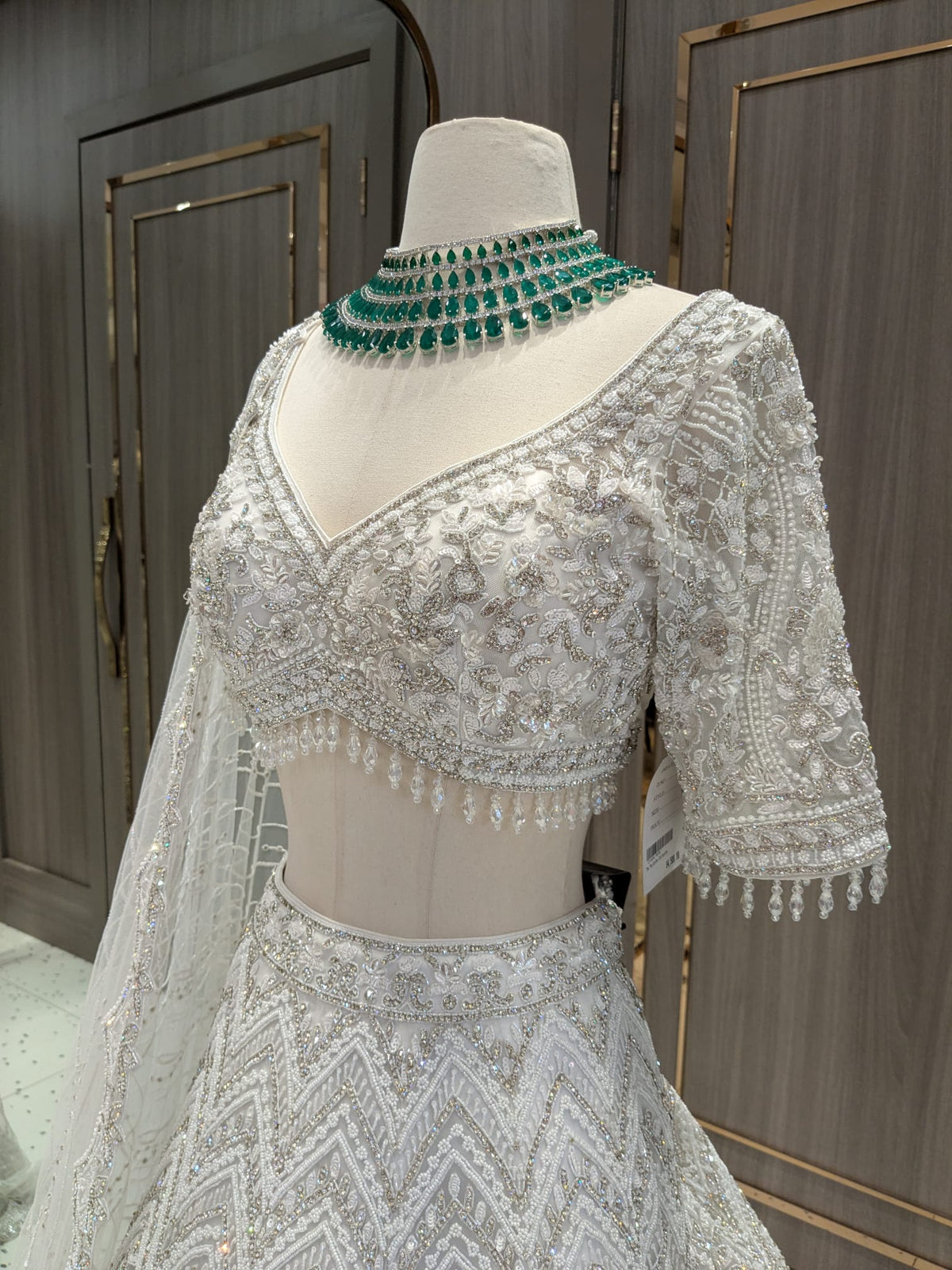 White Tonal Bridal Lehenga with Silver Stones, Pearls and Sequin Work