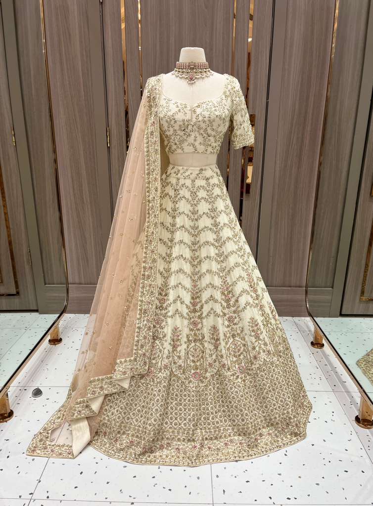 Ivory Bridal Lehenga with Gold and Pastel Embroidery and Net Dupatta