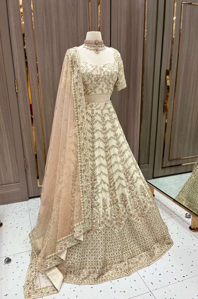 Ivory Bridal Lehenga with Gold and Pastel Embroidery and Net Dupatta