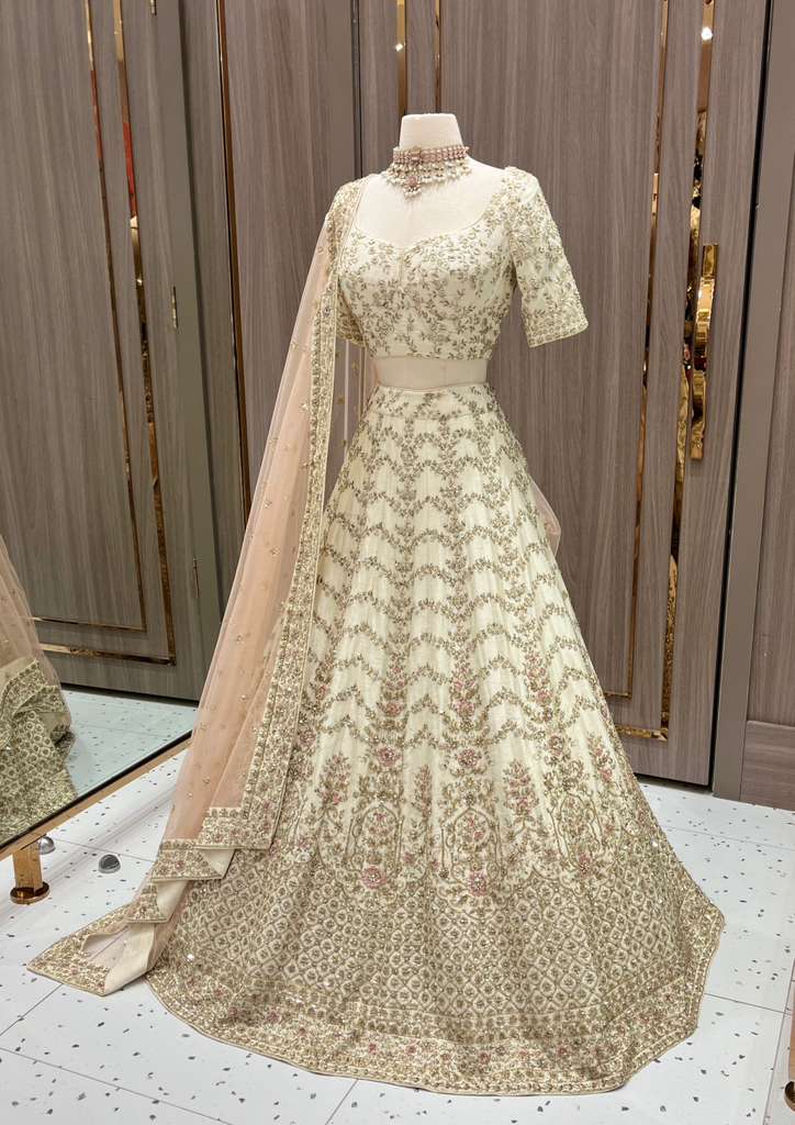 Ivory Bridal Lehenga with Gold and Pastel Embroidery and Net Dupatta