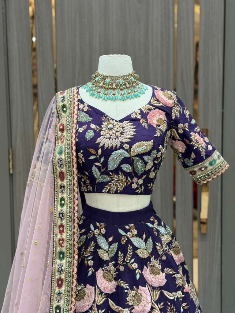 Deep Purple Bridal Lehenga with Multicolor Floral Embroidery and Blush Net Dupatta