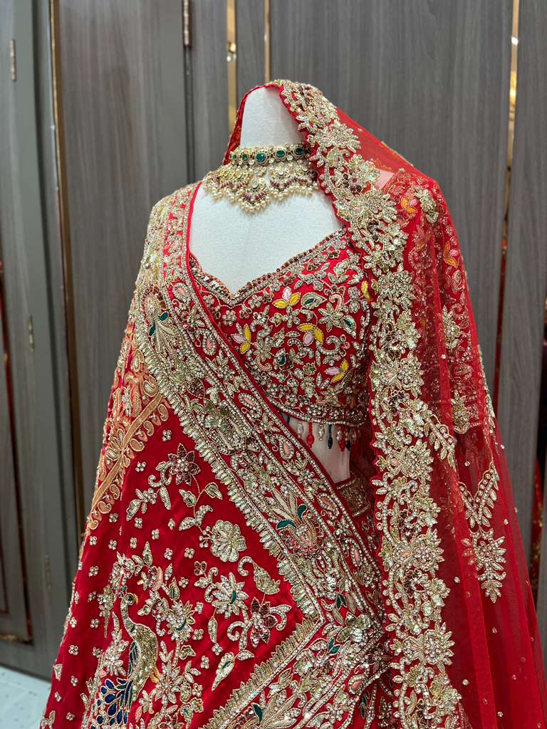Red Bridal Lehenga with Gold Zari Border and Long Train Net Dupatta