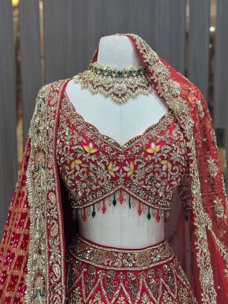Red Bridal Lehenga with Gold Zari Border and Long Train Net Dupatta