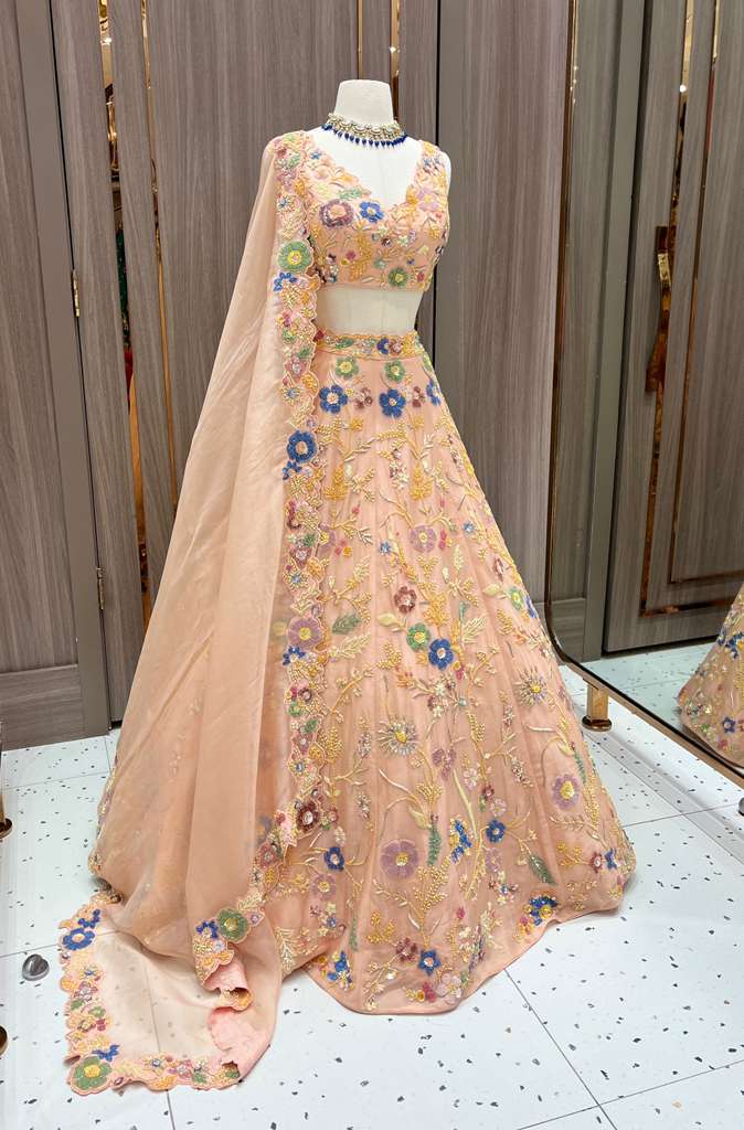 Peach Lehenga with Multicolor Floral Embroidery and Net Dupatta