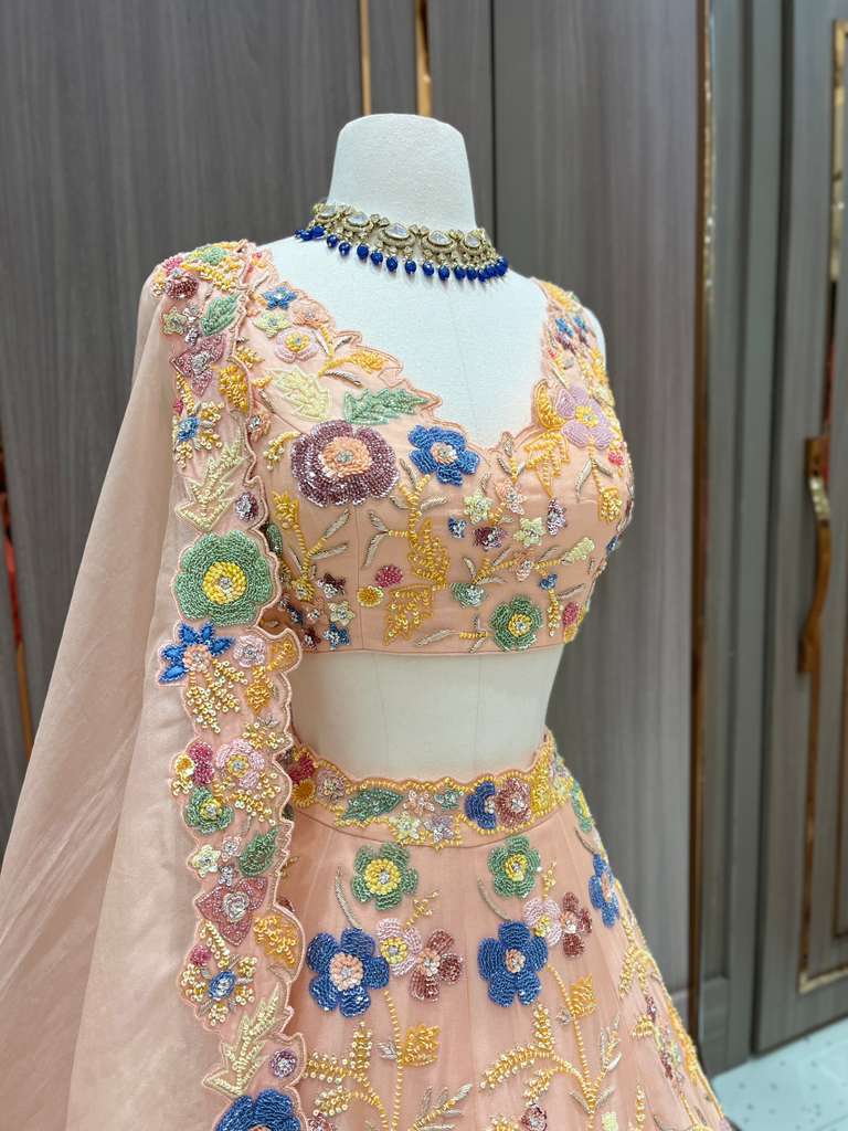 Peach Lehenga with Multicolor Floral Embroidery and Net Dupatta