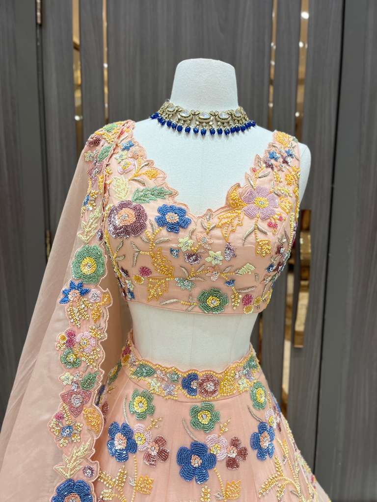Peach Lehenga with Multicolor Floral Embroidery and Net Dupatta
