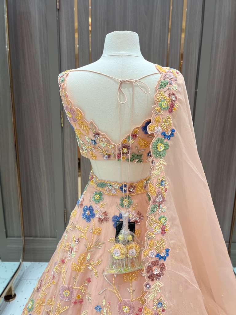 Peach Lehenga with Multicolor Floral Embroidery and Net Dupatta