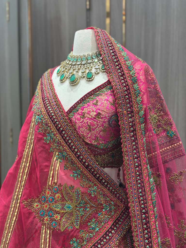 Magenta Pink Bridal Lehenga with Multicolor Embroidered Borders and Dupatta