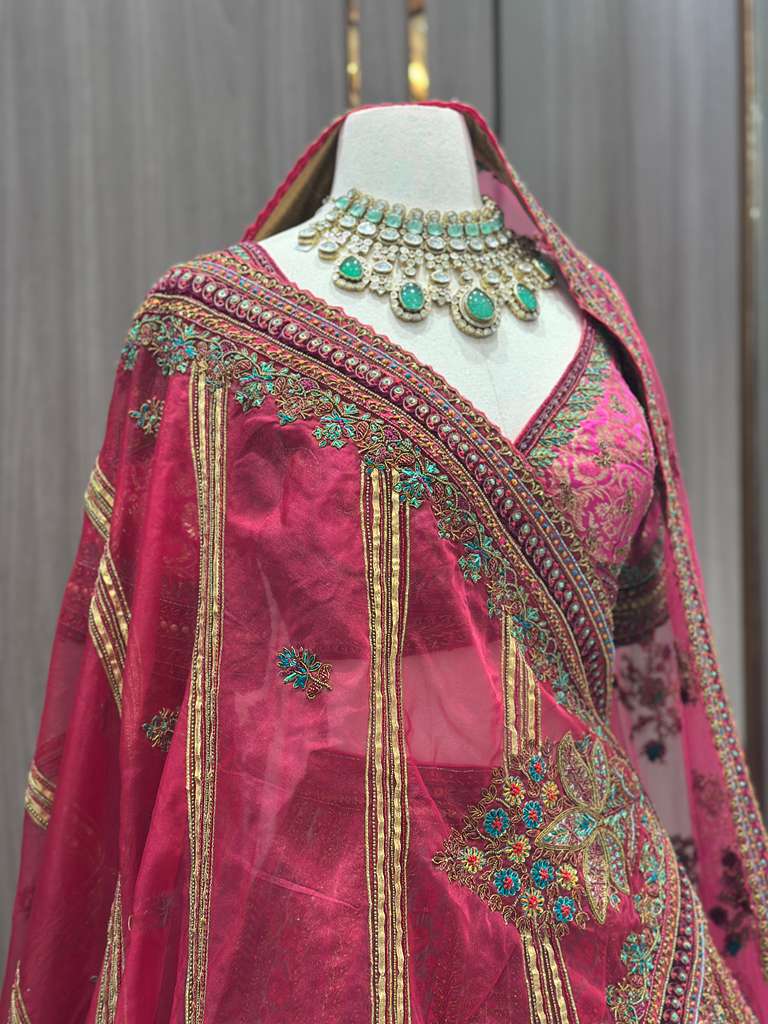 Magenta Pink Bridal Lehenga with Multicolor Embroidered Borders and Dupatta