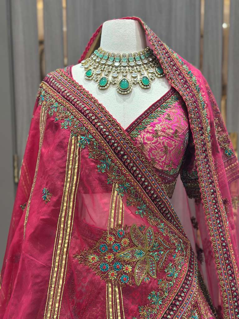 Magenta Pink Bridal Lehenga with Multicolor Embroidered Borders and Dupatta