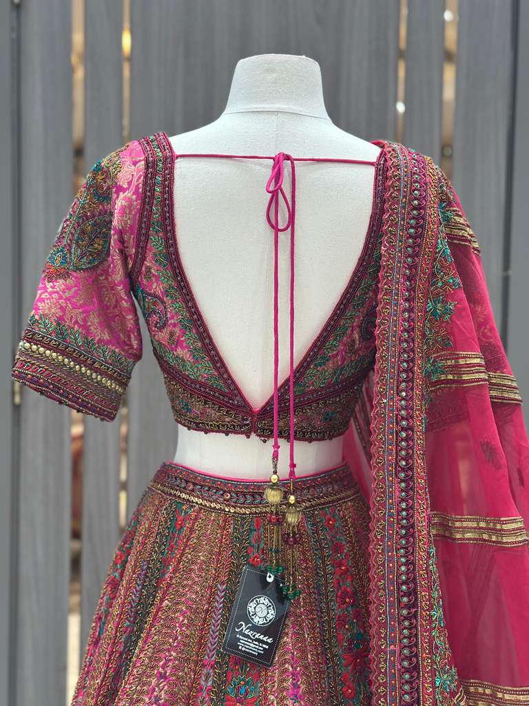 Magenta Pink Bridal Lehenga with Multicolor Embroidered Borders and Dupatta