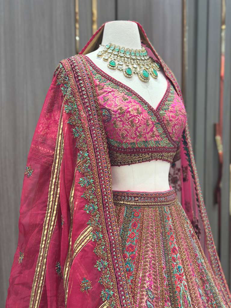 Magenta Pink Bridal Lehenga with Multicolor Embroidered Borders and Dupatta
