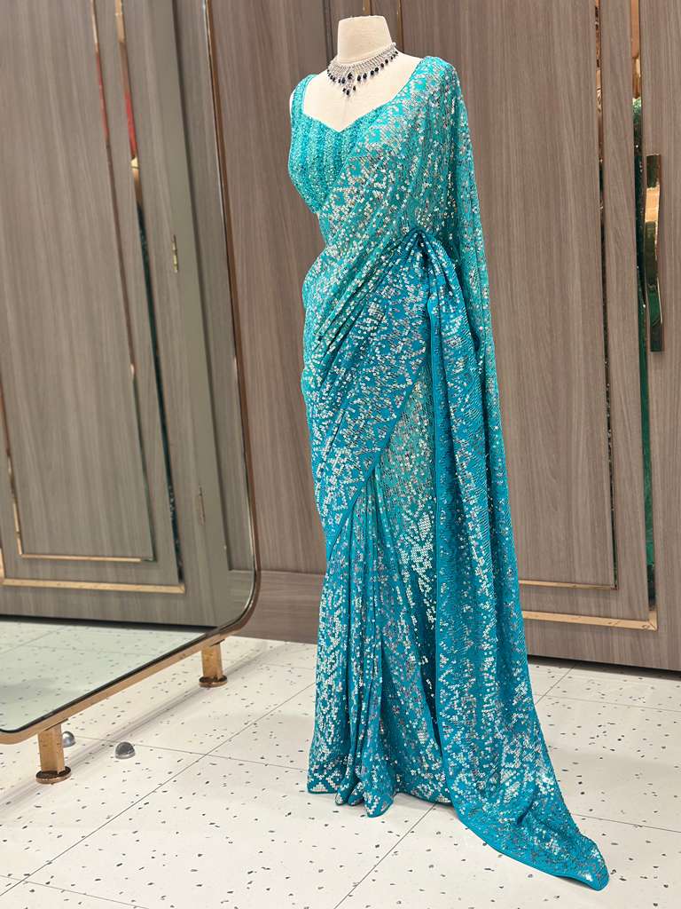 Aqua Blue Sequin Saree with Stripe Work and Sleeveless Blouse