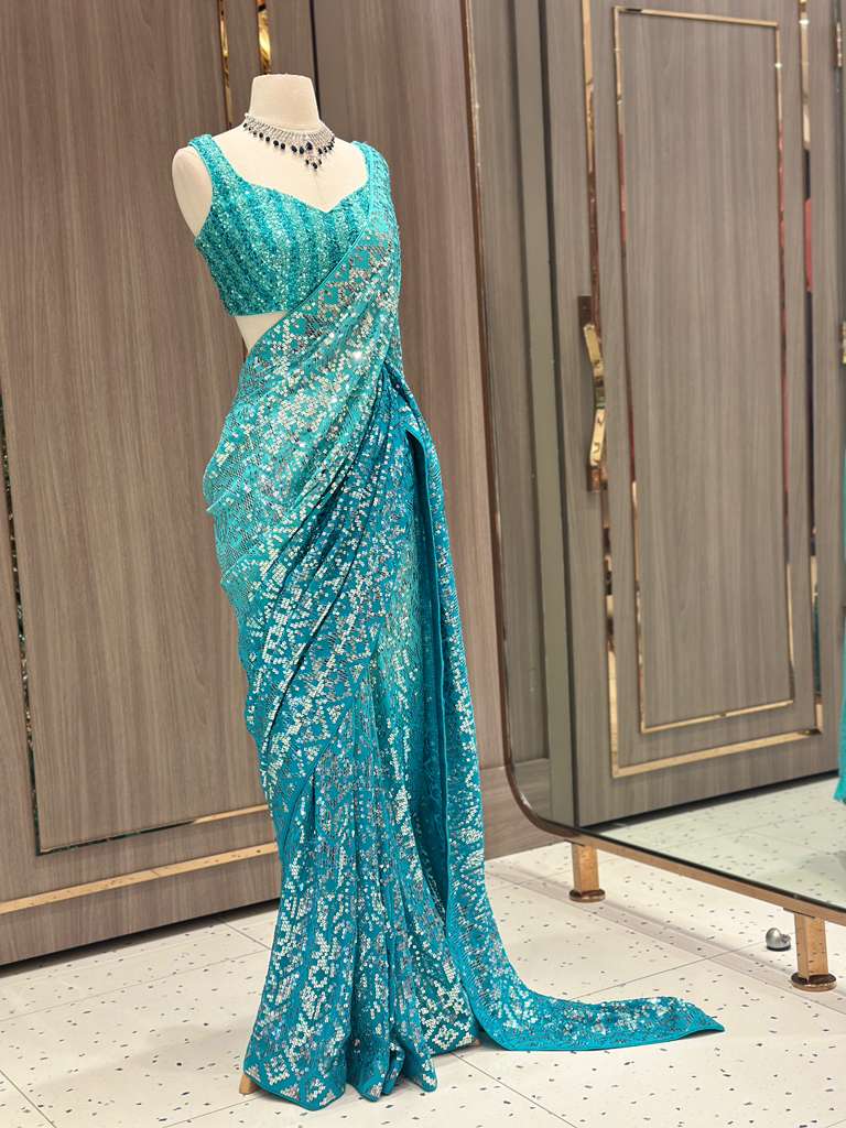 Aqua Blue Sequin Saree with Stripe Work and Sleeveless Blouse