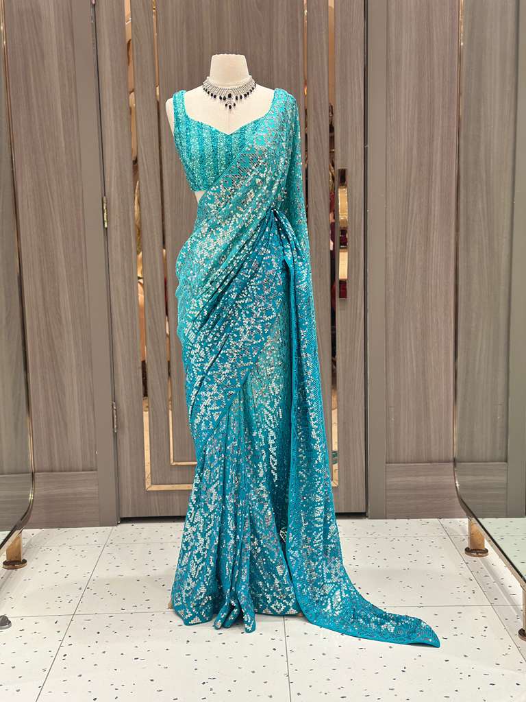 Aqua Blue Sequin Saree with Stripe Work and Sleeveless Blouse