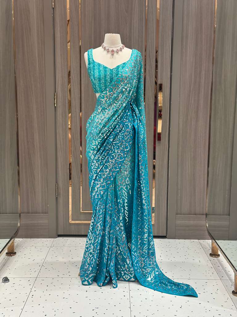 Aqua Blue Sequin Saree with Stripe Work and Sleeveless Blouse
