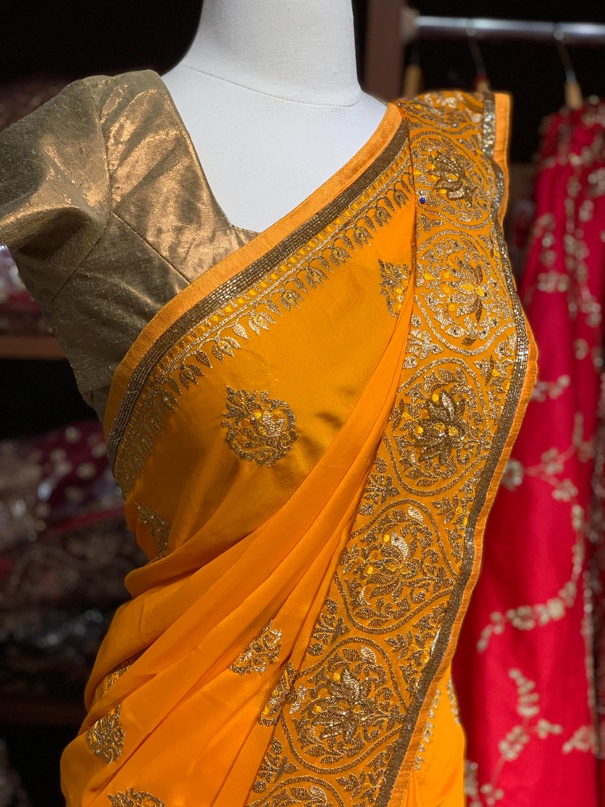 Magnificent  Yellow Georgette Saree