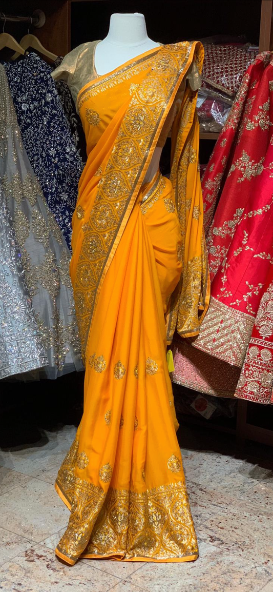 Magnificent  Yellow Georgette Saree