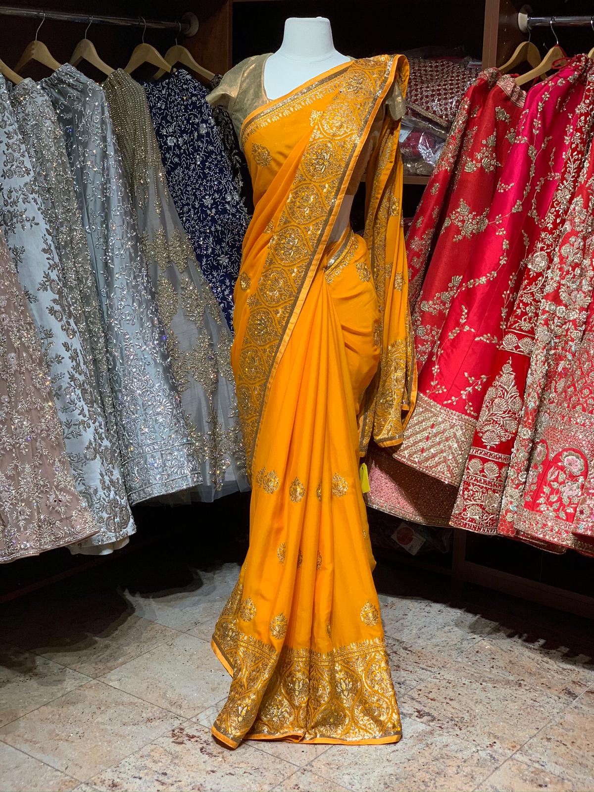 Magnificent  Yellow Georgette Saree